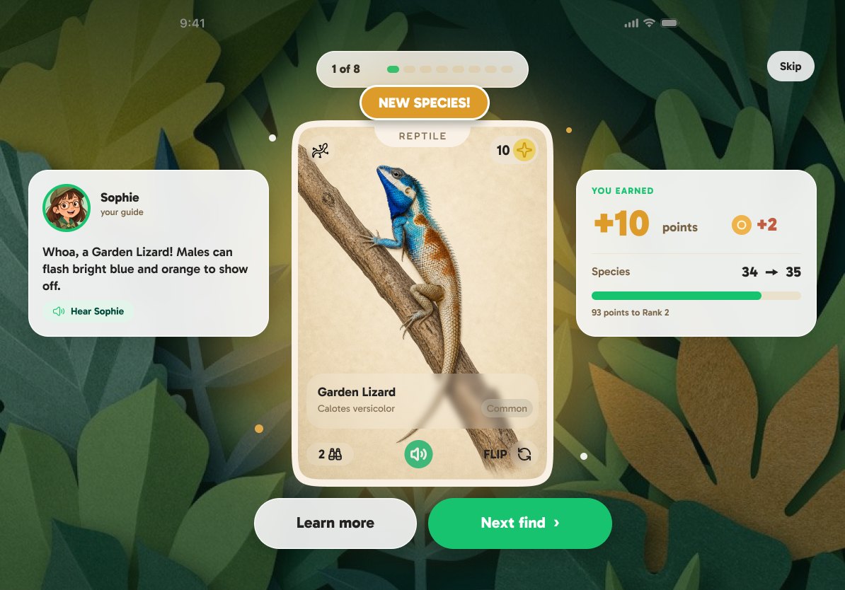 The reveal on a tablet: a Garden Lizard card flipped over with "New species!" above it, the guide describing it in a speech bubble, and "+10 points" and "+2 coins" beside it